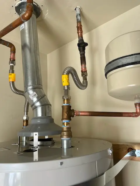Water heater installation and plumbing repair in Fitchville